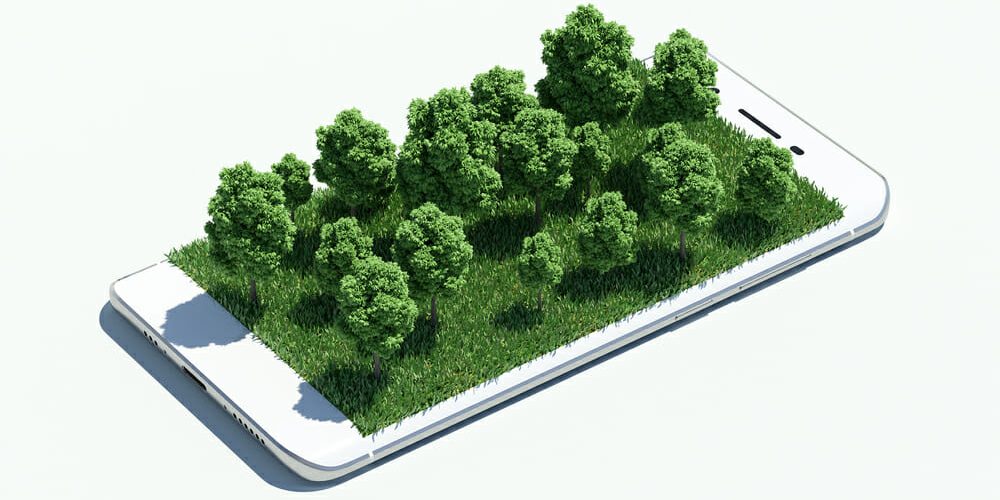 Nachhaltiges Handy mit Wechselakku, aus dessen Display eine Grünfläche mit Bäumen wächst